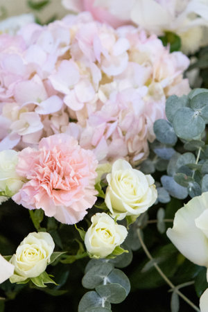 royal bouquet in boho, rustic style. bouquet of soft pink roses, eustomas and eucalyptus branchesの写真素材
