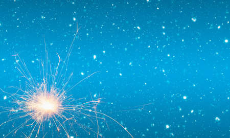 Burning sparkler on abstract snowy background. Happy new year. 3d illustrationの写真素材