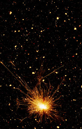 Burning sparkler on abstract snowy background. Happy new year. 3d illustration.の写真素材