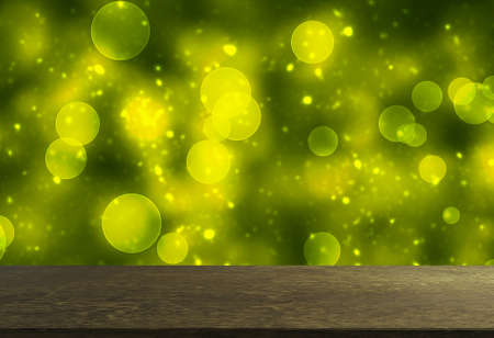 Magical bokeh lights effect background. Colorful defocused lights with empty wooden table.