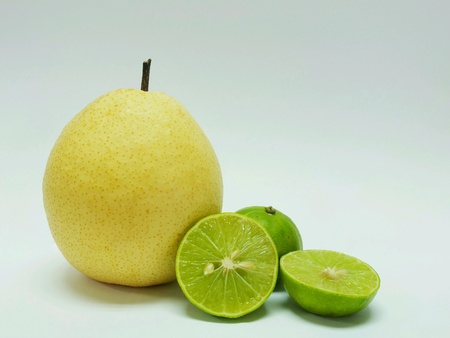 Chinese pear and lime on white backgroundの素材