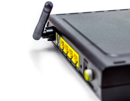 black DSL router back side anterna four port in a white backgroundの写真素材