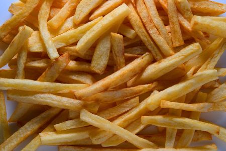 Potatoes fried in white dish