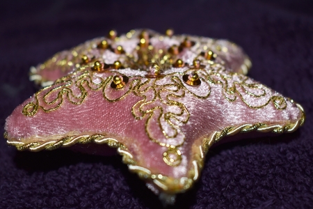 Ornate gold beaded pillow fit for the royalsの写真素材