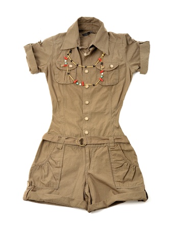 Khaki green safari playsuit with ethnic beaded necklace isolated on white background の写真素材