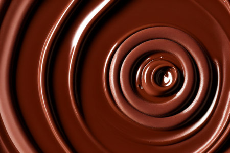 close up of chocolate syrup swirl on white background, sweet food backgroundの素材