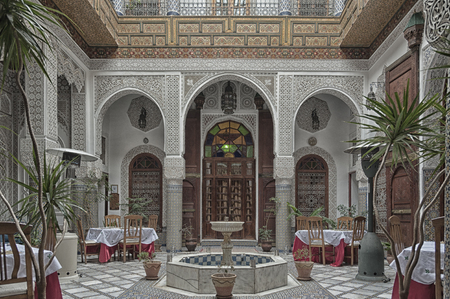 FEZ, MOROCCO - FEBRUARY 19, 2017: Interior of a small family owned hotel in the medina of Fes. The...