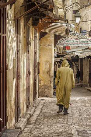 FEZ, MOROCCO - FEBRUARY 20, 2017: Unidentified man walking in the beautiful Medina of Fez, Moroccoのeditorial素材