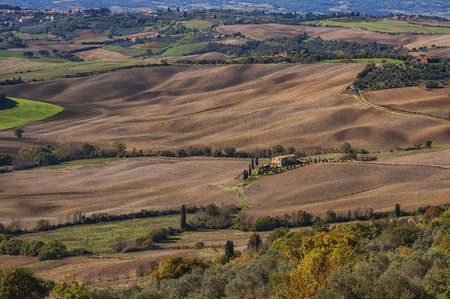Pienza - Tuscany / Italy, October 30, 2016: Scenic Tuscany landscape with rolling hills and valleys in Pienza - Val D'Orcia, Italyのeditorial素材