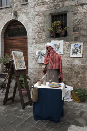 GUBBIO, ITALY - 08 DECEMBER 2017 - A visit to the beautiful medieval town of Umbria Region, during the Christmas holidays, with the nativity scenes of life-size statues in San Martino district - Italyのeditorial素材