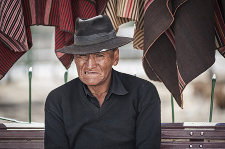 TARABUCO, BOLIVIA - AUGUST 06, 2017: Unidentified indigenous Yabara man with traditional clothing and hat, on the local Tarabuco Sunday Market, Bolivia - South Americaのeditorial素材