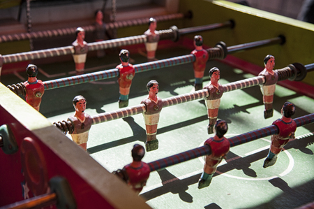 Ancient and vintage Bolivian old wood classic aged Foosball soccer tableの写真素材
