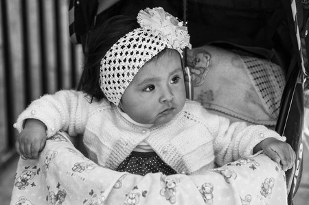 SUCRE, BOLIVIA - AUGUST 07, 2017: Unidentified bolivian child in the street of Sucre, Boliviaのeditorial素材