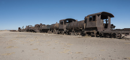 Rusty old and abandoned train at the Cementerio de Trenes in Uyuni desert, Bolivia - South Americaの写真素材
