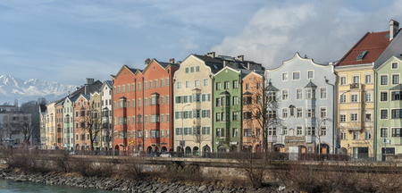 INNSBRUCK, AUSTRIA - JANUARY, 01 2019: Panoramic view of the historic city center of Innsbruck with the colorful houses along the river Inn and the famous Austrian mountain in the background - Tyrol, Austriaのeditorial素材