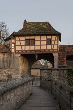 The stronghold gate in the medieval town of Rothenburg ob der Tauber, one of the most beautiful and romantic villages in Europe, Germany, Germanyのeditorial素材