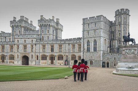 WINDSOR, ENGLAND -MAY, 24 2018: Changing of the guards at Windsor Castle, the residence of the British Royal Family at Windsor in the English county of Berkshire, United Kingdomのeditorial素材