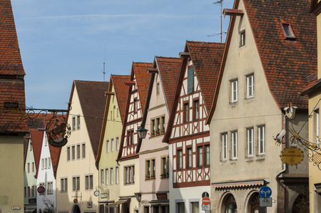 ROTHENBURG OB DER TAUBER, GERMANY - MARCH 05, 2018: Historic colorful half-timbered houses in the medieval town of Rothenburg ob der Tauber, one of the most beautiful villages in Europe, Germany,のeditorial素材