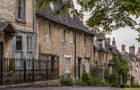 Quaint Cotswold romantic stone cottages on The Hill, in the lovely Burford village, Cotswolds,...