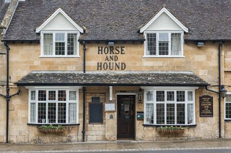 BROADWAY, ENGLAND - MAY, 27 2018: The Horse and Hound public house is a traditional country inn from...