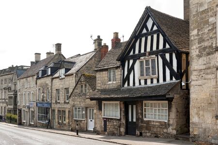 PAINSWICK, COTSWOLDS, UK - MAY 26, 2018: Traditional and typical cottages of Painswick known as the Queen of the Cotswolds. Houses mainly built from the honey colored Cotswold Stone, UKのeditorial素材