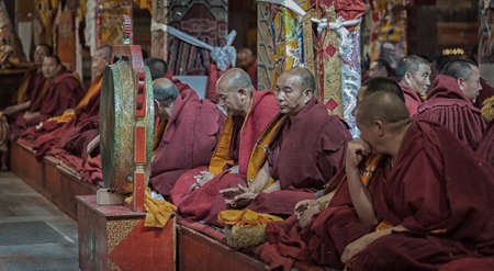 LHASA, TIBET, CHINA - AUGUST, 17 2018: Tibetan monks in the Ganden Monastery located at the top of Wangbur Mountain, Lhasa Tibetのeditorial素材