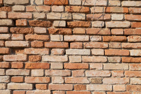 A wall of red briks, perfect for a backgroundの写真素材