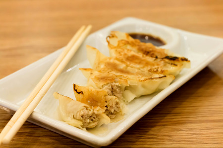 fried dumplings on white plateの写真素材
