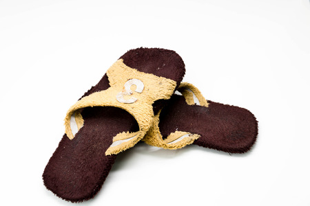 isolated worn out, dirty slippersの写真素材