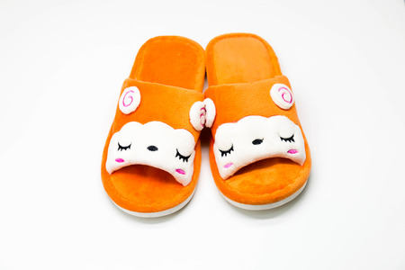 sleepy face of cartoon slippers show the lovely, soft and comfortの写真素材