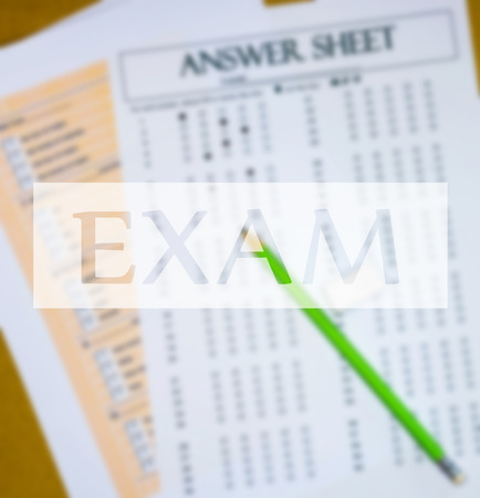 top view of english text box over blur questions and answer sheetの写真素材