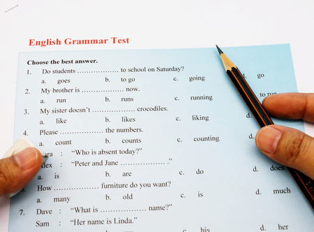blue english grammar test on tableの写真素材