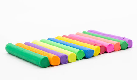 isolated multi colors of clay sticks on white backgroundの写真素材