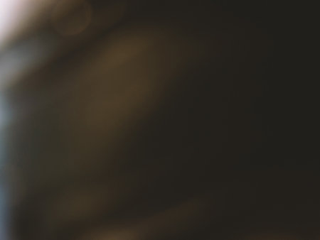 dark abstract background with small bright lightの写真素材