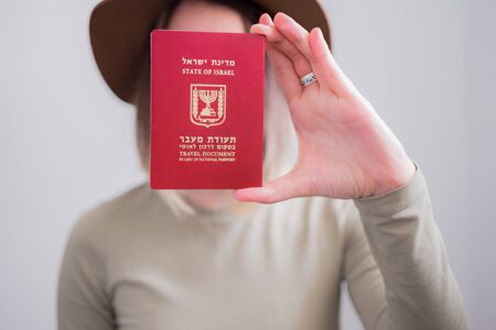 Young woman with Israel passport. Portrait without faceの写真素材