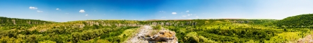 Panorama of the canyon of Rusenski Lom, Bulgaria  The wholes in the rocks are dwellings used as Hesychasm monasteryの写真素材