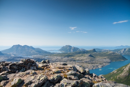 View with fjord and the sea from a peak in Northern Norwayの写真素材
