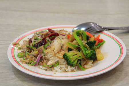 stir-fried mixed vegetables and Thai Mackerel Salad on riceの写真素材
