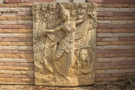 Kinnara statue on the wallの写真素材