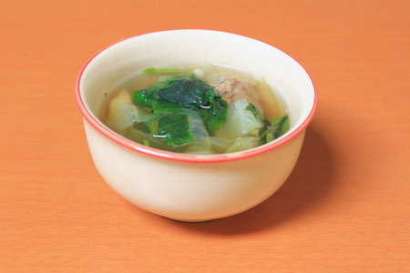 Vegetable gourd soup with minced pork and tofuの写真素材