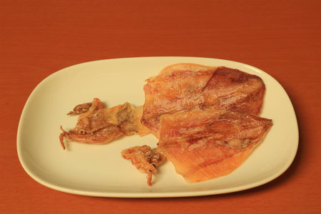 Dried squid on the white dish