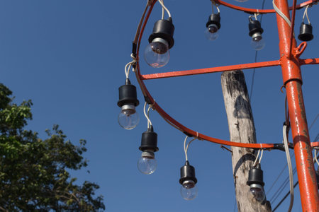 lamp bulb group hang on the red poleの写真素材