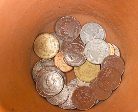 the Thailand coin inside the jarの写真素材
