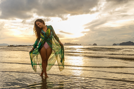 Young girl posses at Ao Nang Beach, Krabi, Thailandの写真素材