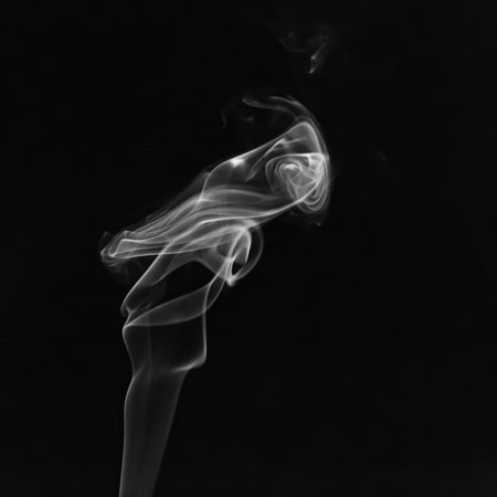 Smoke from an incense stickの写真素材