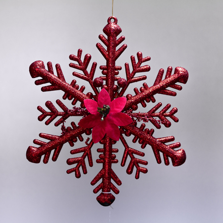 Christmas ornament hanging red ice star with glitterの写真素材