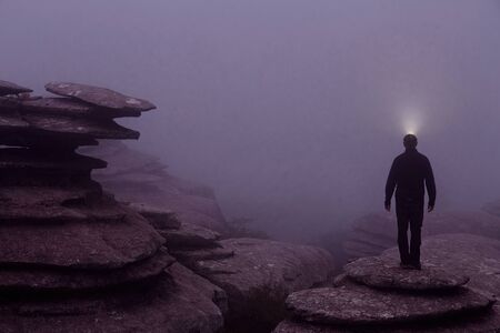Guide lighting in the fog in the Natural Park of El Torcal de Antequera, in Malaga, Andalucia, Spain.の写真素材