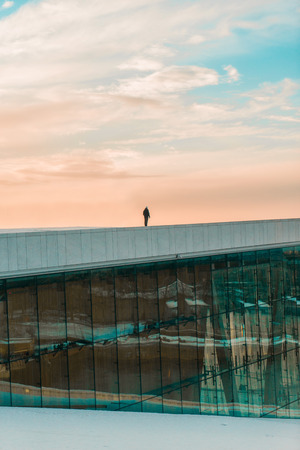 Standing on top of Oslo Opera Houseのeditorial素材