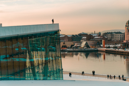 Standing on top of Oslo Opera Houseのeditorial素材