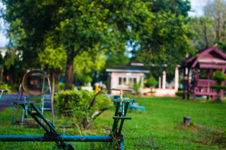 Old rusty bicycle in the public park. Selective focus. nature.の写真素材